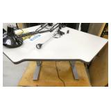 3 lamps and a corner desk