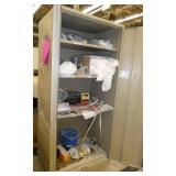 Cabinet full of lab clothing, face shields