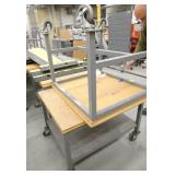 Two tables on wheels 34x31x30 and 30x38x26