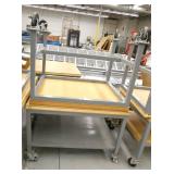 Two tables on wheels 30x36x29 and 30x38x26