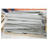 Large lot of garage shelving all taken down