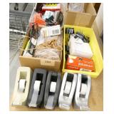 Office supplies, tape dispensers, new boxes of binders, paper clips, highlighters, staples