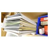 Office supplies, probably 25 tape dispensers, new boxes of tape, paper clips and a bunch of note pads