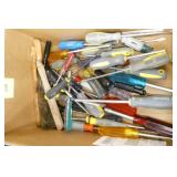 Lot of screwdrivers, socket wrenches etc and gloves