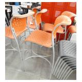 12 orange plastic seat tall chairs