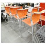 12 orange plastic seat tall chairs