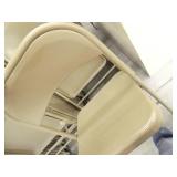 12 steel folding chairs in mobile cart