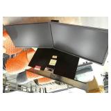 Set of 2 Dell monitors mounted on a stand