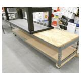 Short mobile shelving and black wood table