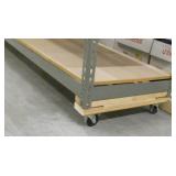 Short mobile shelving and black wood table