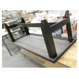 Short mobile shelving and black wood table