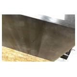 Short mobile shelving and black wood table