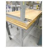 Two wood top worktables