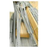 6 pallets full of (green) steel garage shelving with wood shelving