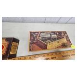 Pair of Firearm Themed Avon Cologne Bottles w/boxes