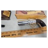 Pair of Firearm Themed Avon Cologne Bottles w/boxes