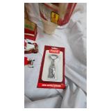 Treasure Trove of Coca Cola Items-Mug, License Plate, bottle opener, and Misc