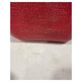 Three Red Plastic Gas Cans