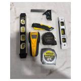 Assorted Hand Tools Lot - including levels, tape measures, a utility knife, a stud finder, and a combination square.
