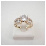 Lady’s 14K Yellow Gold Cubic Zirconia Ring with Baguette & Round Accents. Ring Size 10.