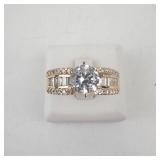 Lady’s 14K Yellow Gold Cubic Zirconia Ring with Baguette & Round Accents. Ring Size 10.