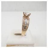 Lady’s 14K Yellow Gold Cubic Zirconia Ring with Baguette & Round Accents. Ring Size 10.