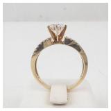 Lady’s 14K Yellow Gold Cubic Zirconia Ring with Baguette & Round Accents. Ring Size 10.