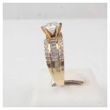 Lady’s 14K Yellow Gold Cubic Zirconia Ring with Baguette & Round Accents. Ring Size 10.