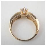 Lady’s 14K Yellow Gold Cubic Zirconia Ring with Baguette & Round Accents. Ring Size 10.