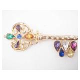 Key-Shaped Gold-Tone Brooch with Multicolor Gemstones