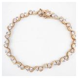 Gold-Tone Wave-Link Bracelet with Round-Cut Stones - 8-Inch Length
