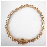 Gold-Tone Wave-Link Bracelet with Round-Cut Stones - 8-Inch Length