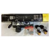 Minolta XG7 Single Lens Reflex 35mm Camera Serial #1275017 with 55mm Hoya Skylight Lens and Tripod