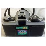 Minolta XG7 Single Lens Reflex 35mm Camera Serial #1275017 with 55mm Hoya Skylight Lens and Tripod