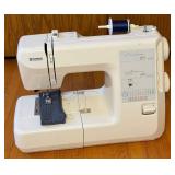 Kenmore Sewing Machine Model 385.17324 with Assorted Supplies