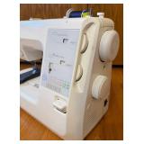 Kenmore Sewing Machine Model 385.17324 with Assorted Supplies