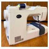 Kenmore Sewing Machine Model 385.17324 with Assorted Supplies