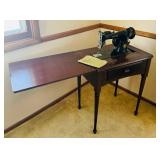 Vintage Singer Sewing Machine Model 66 in Wooden Cabinet