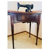 Vintage Singer Sewing Machine Model 66 in Wooden Cabinet