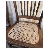Set of Four Vintage Oak Pressed Back Dining Chairs with Cane Seats