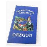 1 pressed penny collection in album:  17 pieces from various vacation spots