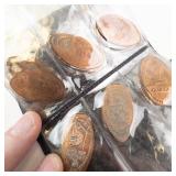 1 pressed penny collection in album:  17 pieces from various vacation spots