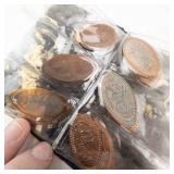 1 pressed penny collection in album:  17 pieces from various vacation spots