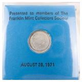 Limited edition mini coin made from a melt of silver that traveled to the moon with Apollo 14