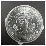 1 tube of 20 Uncirculated silver half dollars: 10 Franklins, 10 Kennedys, Approx. 7 1/4 oz