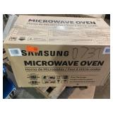 Samsung 1.6 cu. ft. 1000 W Stainless Steel Over-the-Range Microwave with Auto Cook Model # ME16A4021AS