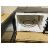 BLACK+DECKER EM925AZE-P 0.9 Cubic Foot 900 Watt Stainless Steel Microwave with Turntable, Cu.Ft, Black/Silver Model # EM925AZE-P (Used)