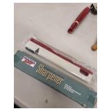 Vintage Kitchen Utensil Lot with Knife, Can Opener, Nutcracker, and Knife Sharpener