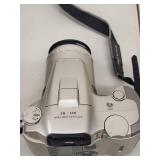 Olympus 35mm Film Camera with 28-140mm Lens, Lens Accessories, and Case