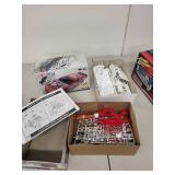 Set of 3 Model Car Kits Including Revell Ford T, NASCAR, and Johnny Lightning